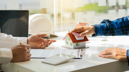 A real estate agent advises clients to buy or rent a real estate house to transfer the right to...