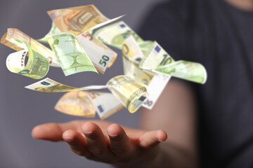 bill euro banknote in hand rain