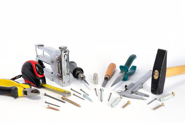 Repair tools and various parts on a white background