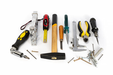 Repair tools and various parts on a white background