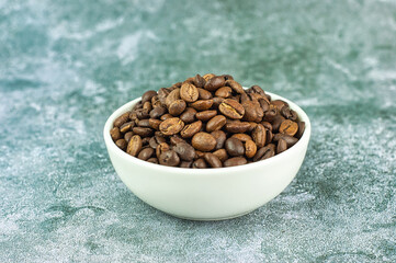 Roasted coffee beans in pots