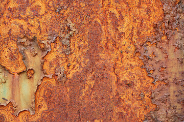 Rusty old metal texture with peeling paint as abstract background.