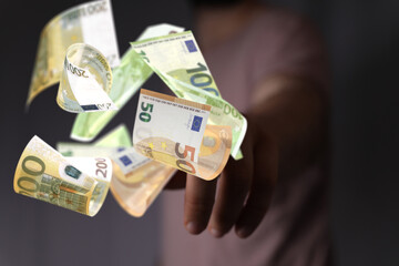 bill euro banknote in hand rain