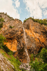 Rinka waterfall located in Logarska dolina national park in Slovenia, Second highest waterfall in Slovenia. Popular hiking destination in the Alps © Zedspider