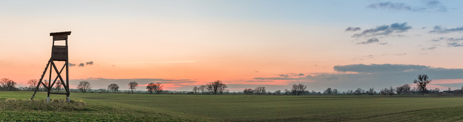 sunset over the field, hunting pulpit, panorama