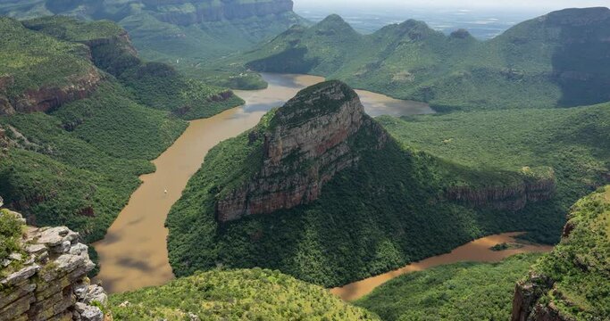 Blyde river canyon. Time lapse of drifting cloud shapes over green canyon. Biggest green canyon in the world