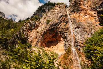 Rinka waterfall located in Logarska dolina national park in Slovenia, Second highest waterfall in Slovenia. Popular hiking destination in the Alps © Zedspider