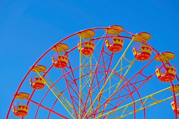 Ferris wheel in the summer morning