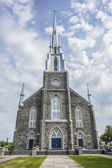 Obraz premium View of Church of St. Patrick (Paroisse-de-Saint-Patrice, 1855) in Village Riviere-du-Loup (200 kilometers east of Quebec City). Quebec province, Canada.