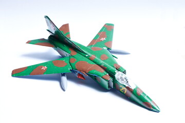 Russian plane Mig-23 from Cold War time. Hand painted toy, glued plastic plane.