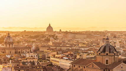 Fototapeta na wymiar Rome. Scenic view at sunset from the Vittoriano over the town towards St. Peter's Basilica