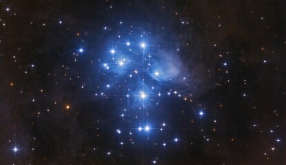 Starry Night Sky with the Pleiades open Star Cluster and the surrounding blue Reflection Nebula and...