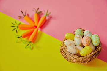 Easter eggs on the yellow -pink background. Happy Easter. Holiday concept.