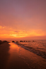 Fototapeta na wymiar stunning seascape with bright red evening sky
