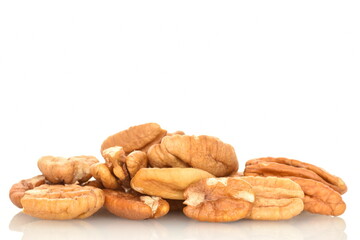 Several ripe peeled pecans, close-up, isolated on white.