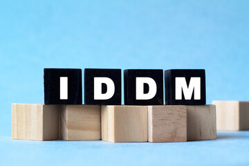 IDDM. The text is on the dark and light cubes. Bright solution for Medical, marketing concept