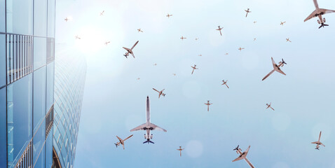 Many passenger planes fly in overcrowded airspace - obrazy, fototapety, plakaty