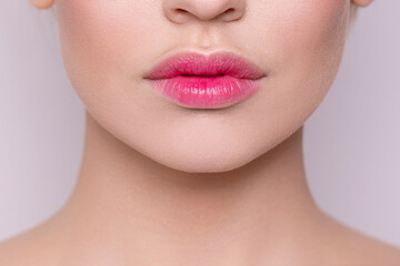 Delicate pink lips close-up. Natural nude lips close-up. Botex. Beautiful natural lips. Fashion....