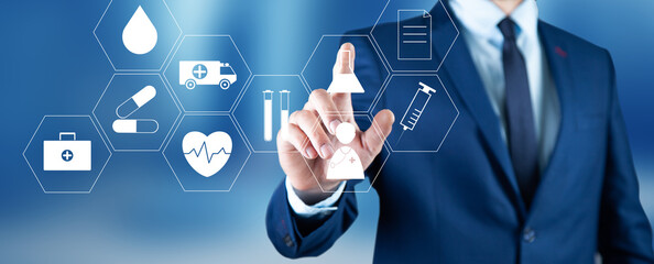 business man touching Medical icon