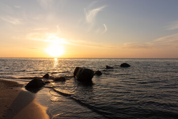 Fototapeta na wymiar Scenic seascape at sunset as sea wallpaper