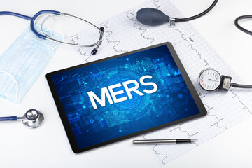 Close-up view of a tablet pc with medical abbreviation