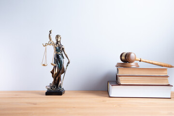 justice lady with judge on books