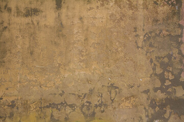 Wall with plaster coming off - vintage background	
