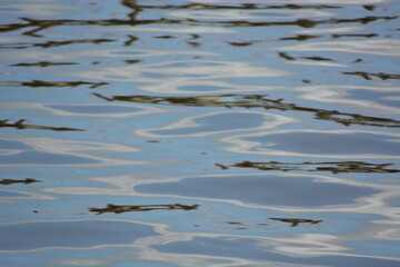 The smooth movement of the water conveys tranquility and peace.