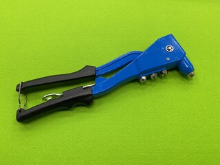 Blue rivet tool on isolate
