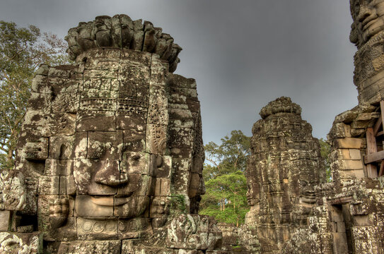 Sunset at The Bayon Temple located at Angkor in Cambodia   