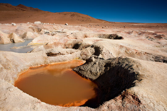 Minerals are mixed and blended naturally in boiling pits high in the Andes at the Sol de Manana Geyser field in southwestern Bolivia.     