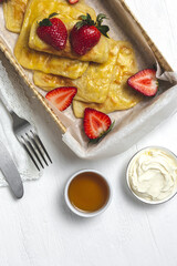 Homemade rghaif or msemen Arab with honey and cream cheese