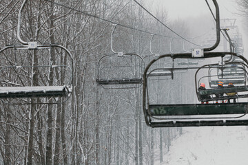 Ski Lift in Snowy and Foggy Weather
