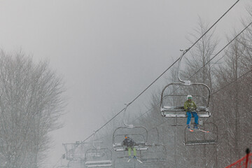 Ski Lift in Snowy and Foggy Weather