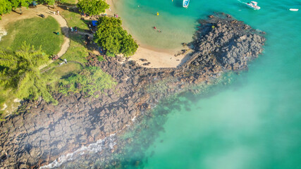 Aerial view of Grand Baie coastline from drone, Mauritius