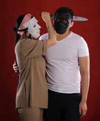 halloween holiday, guy and girl in masks