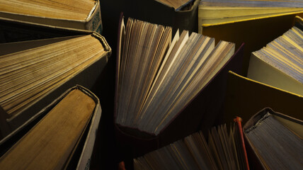 Books. many open books, top view