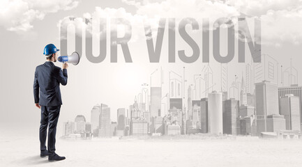 Fototapeta premium Young businessman with hard hat