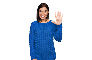 Young hispanic woman wearing casual clothes showing and pointing up with fingers number five while smiling confident and happy.
