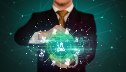 Hand holding healthcare icons