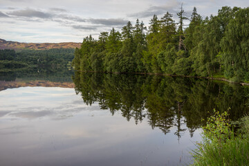 Fototapeta na wymiar Reflections in Loch Alvie