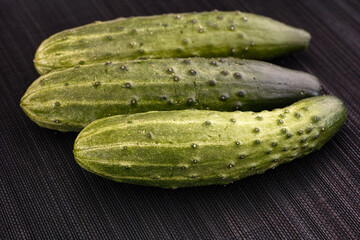Green cucumbers. Low key.
