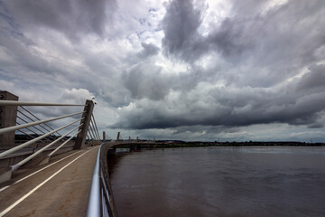 cloudy sky after storm under the Puch bridge in city Ptuj © Miro