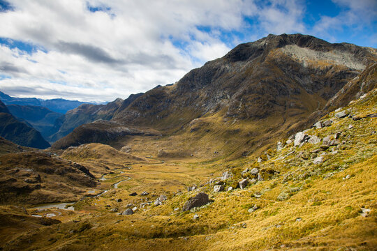 A rocky trail above Lake Harris on day two of the Routeburn Trak (designated as a Great Walk category) in New Zealand's South Island near the town of Glenorchy. 