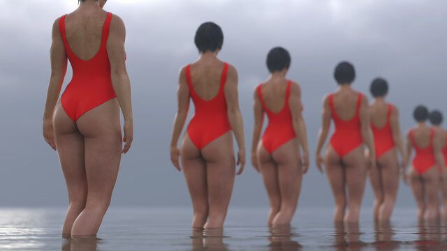 group of women standing in water 