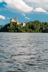 Fototapeta na wymiar medieval castle on the lake shore