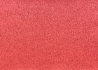 The surface texture of pink leather, background.