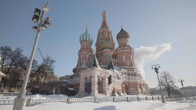 St. Basil's Cathedral on sunny winter day. Action. Bright temple on Red Square in Moscow. Monument of Russian architecture-St. Basil's Cathedral