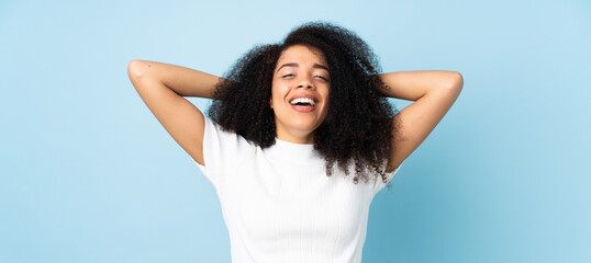 Young african american woman over isolated background laughing