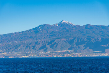 Seaside view of Tenerife dominated by Pico de Teide volcano, Canary islands, Spain